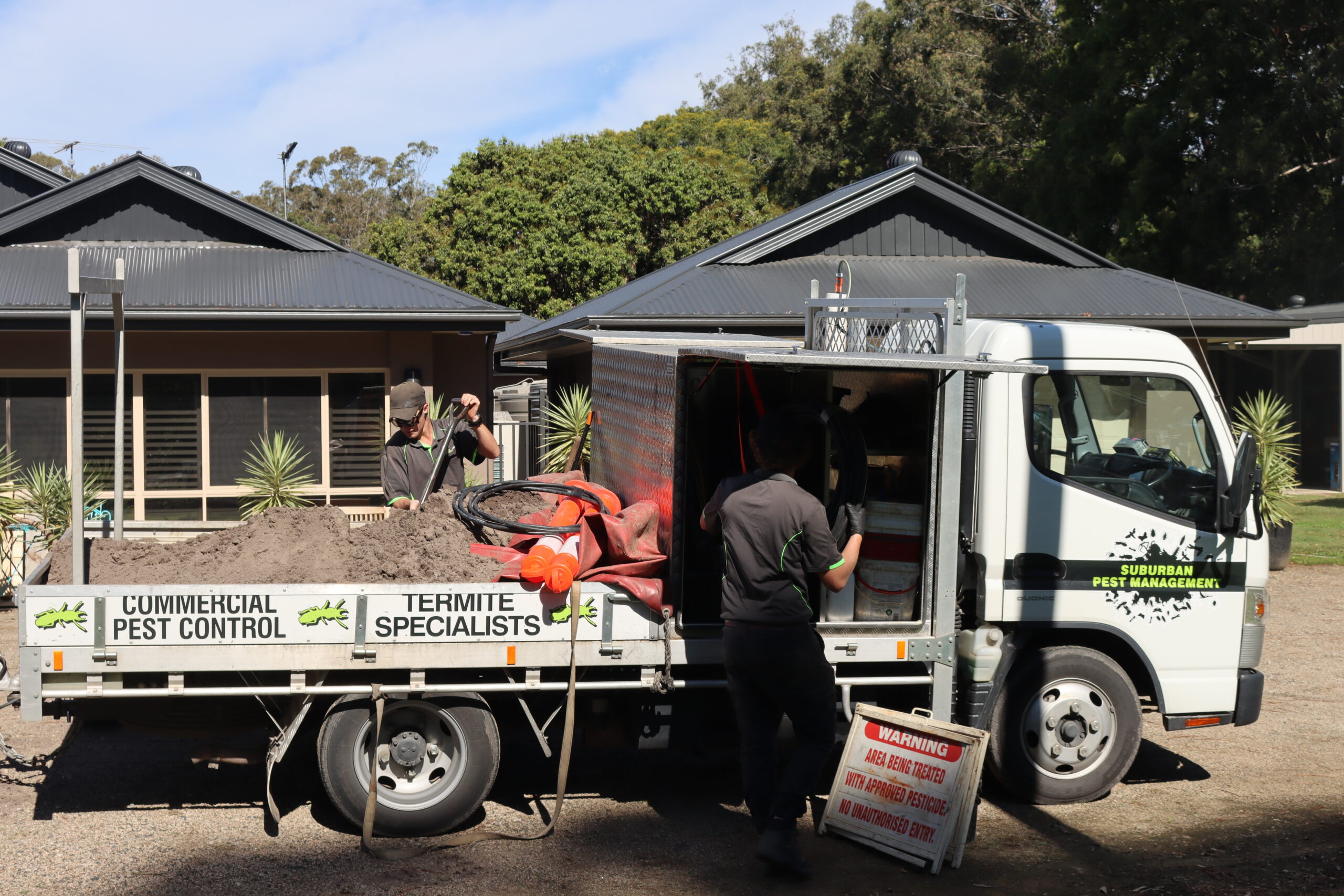 Suburban Pest Management service vehicle in Forest Lake